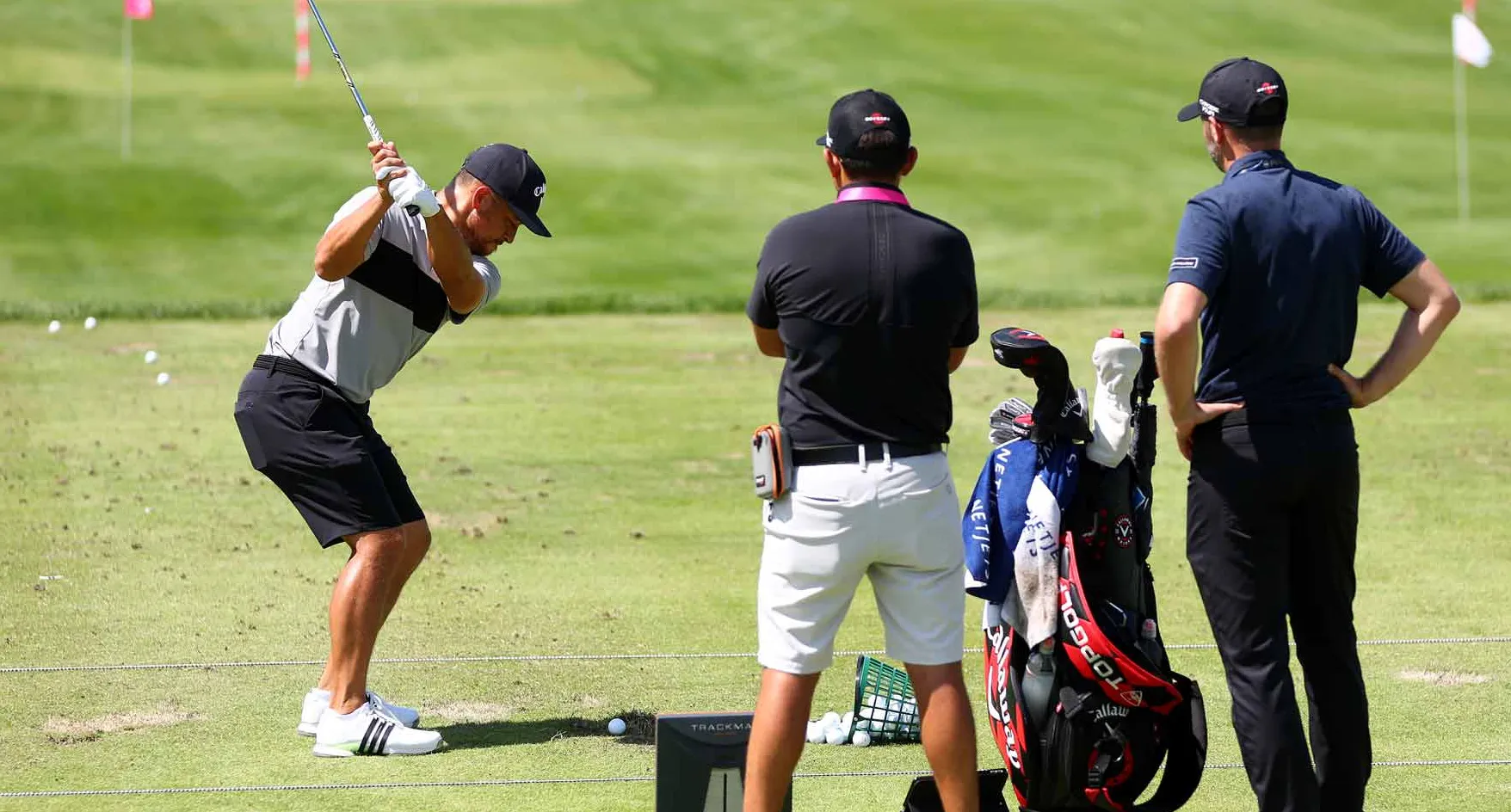 Xander Schauffele of the United States plays a shot on the driving range during a practice round prior to the 2024 PGA Championship at Valhalla Golf Club on May 13, 2024 in Louisville, Kentucky.