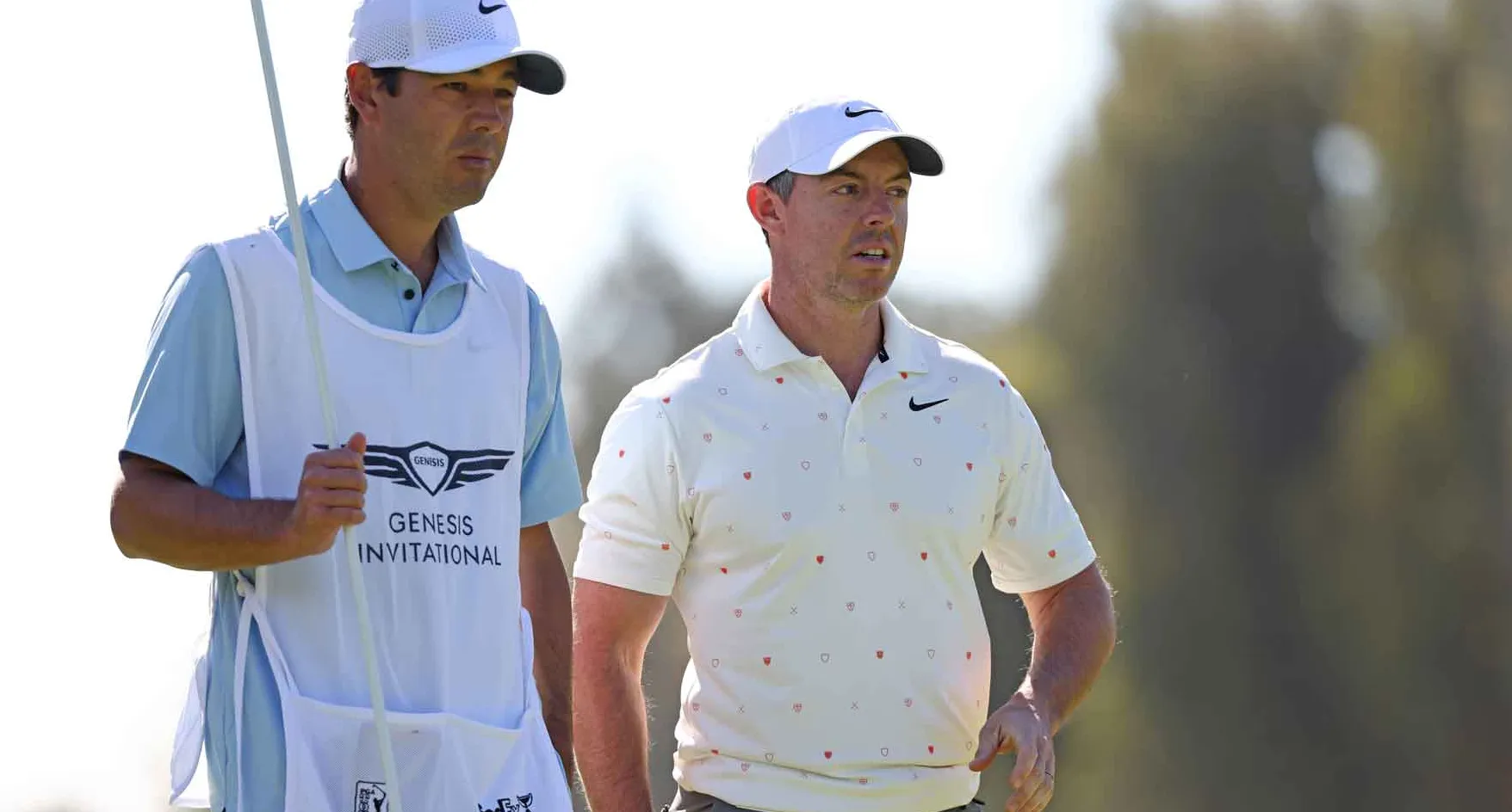 Rory McIlroy of Northern Ireland and caddie Harry Diamond prepare to putt on the 11th green during the third round of The Genesis Invitational 2026 at Riviera Country Club on February 21, 2026 in Pacific Palisades, California.