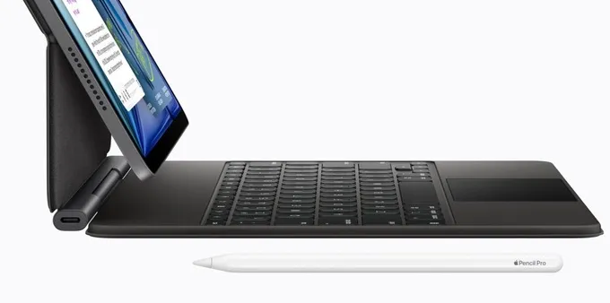 An iPad Air with the Magic Keyboard attached and the Apple Pencil Pro