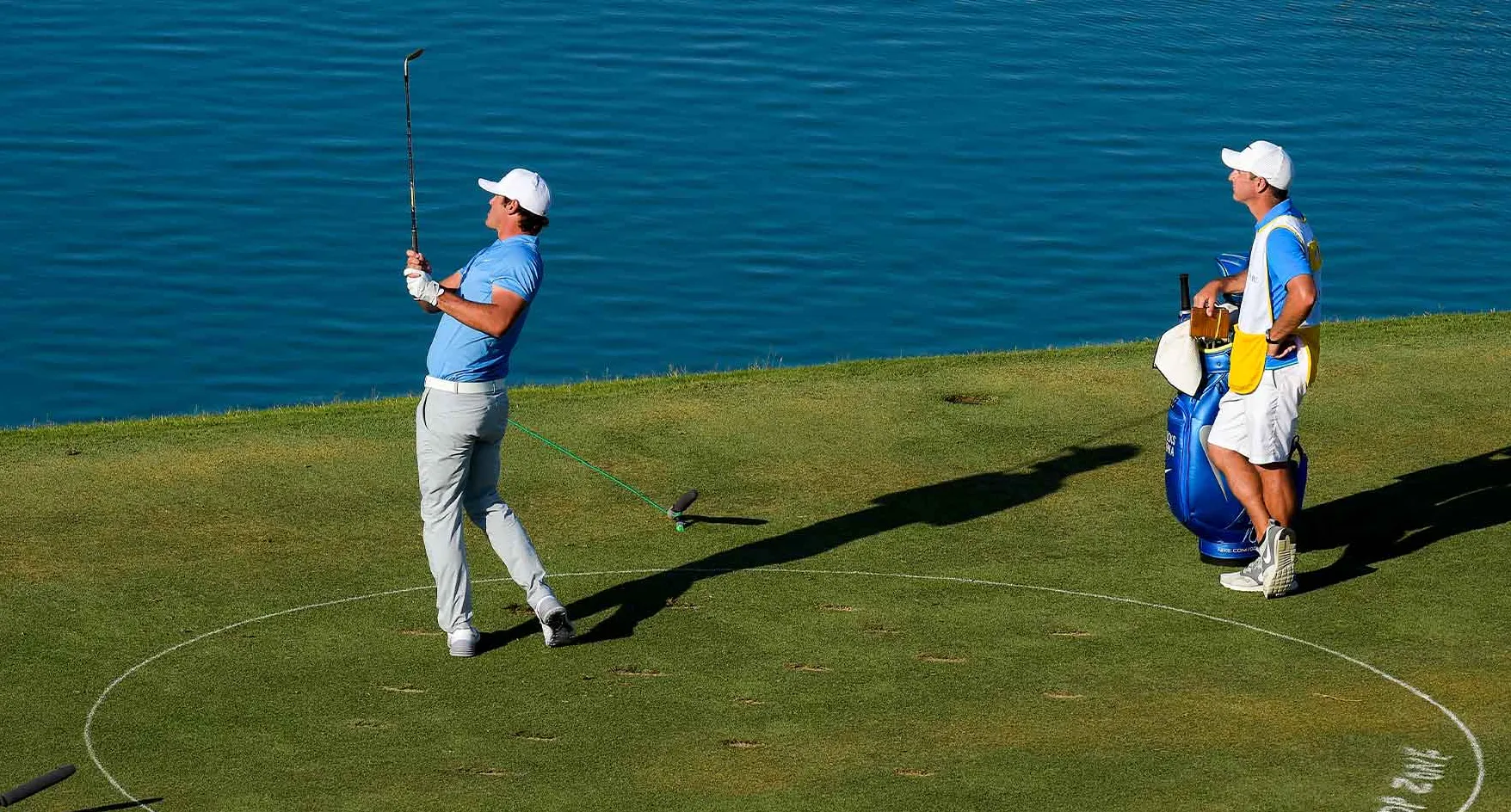 brooks koepka swings from players championship drop zone at the 17th hole
