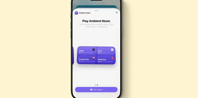 An iPhone displaying new Ambient Music widgets in iOS 26.4