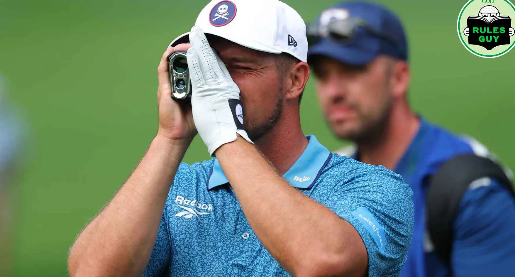 Bryson DeChambeau of the United States uses a rangefinder before hitting an approach shot on the 12th hole during the second round of the PGA Championship at Quail Hollow Country Club on May 16, 2025 in Charlotte, North Carolina.